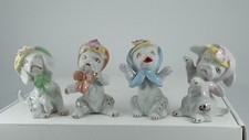 VINTAGE N.O.S. Japanese Dog Figurines SET OF 4  FROM 50'S AND 60'S picture