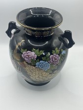 Elegant Black Porcelain Vase with Golden Peacock and Floral Motif picture