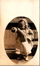 Antique RPPC Postcard 1907-1914 Young Child Pointing Candid Real Photo picture