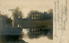 WELLINGTON, OHIO POSTCARD - 1905 RPPC - TREES, WATER, PEOPLE picture