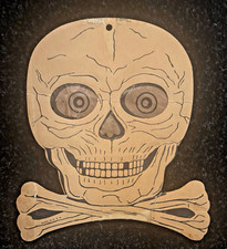 vintage H E Luhrs die cut skull with eyes Halloween decoration picture
