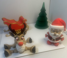 3D Articulated Santa & Rudolph in multiple colors W/ Red Santa's Sleigh & Tree picture