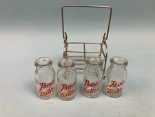 Vintage miniature milk bottles and carrier, Bottles are 1