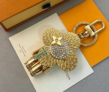 Cute Flower Shaped Keychain Bag Charm with Sparkling Crystals, Gold Tone Metal picture