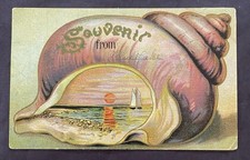 SOUVENIR FROM BLUE LAKE MI SEASHELL SUNSET SAILBOAT MECOSTA 1910 POSTED.    C321 picture