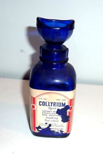 Vintage Wyeth Collyrium Eye Lotion bottle with eye wash cup lid. Cobalt blue 6oz picture
