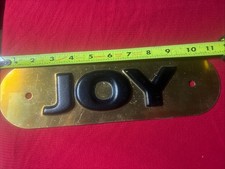 JOY GLOBAL COAL MINING BRASS PLATE NEVER USED ON EQUIPMENT. picture