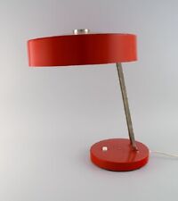 Large adjustable desk lamp in original red lacquer. 1970's.  picture