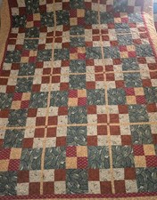 Vintage Handmade Quilt With Warm Green, Brown, And Tan Autumn Patchwork picture