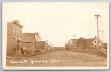 Almena WI~Main St~Flour & Feed Store~Hotel~Sherwin-Williams Paint Sign~RPPC 1916 picture