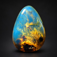 Natural orange blue polished Dominican amber picture
