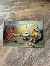C. 1910 Tucks Postcard Devil & Jack O Lantern JOL Halloween Tug of War Postcard picture