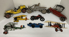 vintage homco and sexton cast wall art-8 pieces,planes,cars motorcycles picture