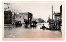 Vintage Cameron Wisconsin Flood Men Canoeing in Main St Cars RPPC Postcard 1934 picture