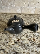 traditional black Japanese side-handled teapot picture