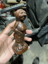 Hand-carved wooden KumanThong figurine picture