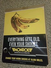 Vintage Mint In Box 2012 Monroe Shock Absorber Embossed Tin Tacker Sign,Bananas picture