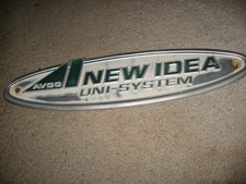 New Idea Uni-System Vintage Farm Implement Emblem Plaque Aluminum picture