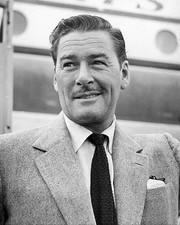 Errol Flynn arrives London airport where he begins work a film ver- Old Photo picture