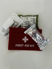 Small First AD Bag That Includes 2 QuikClot  (2031) and 1 Suture removal tray.  picture