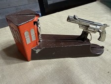 Vacumet vintage wild west metal coin shooter bank picture