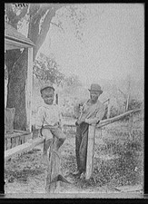 Photo:Little Eb Snow African American Boy Fence Portrait 1900s Detroit picture