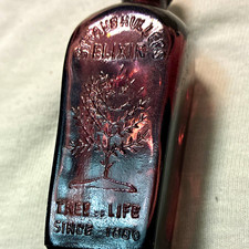 Purple Glass Miniature Bottle Embossed Straub Hullers Elixir 