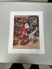 vintage 1992 Caffco Christmas art print featuring Santa Claus in his workshop  picture