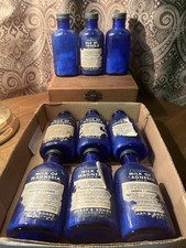 Lot of 9 Vintage Cobalt Blue Milk of Magnesia Bottles Sharp & Dohme 1930s picture