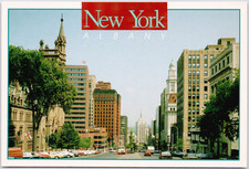 NY Albany Downtown Street Cityscape Tall Buildings Church Spire Traffic Postcard picture