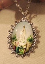 Lovely Lacy Rimmed Silvertone Our Lady of Fatima Cameo Medal Pendant Necklace picture