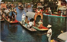 POSTCARD- FLOWER -DECKED BOATS CARRY EXCURSIONISTS, XOCHIMILCO, MEXICO picture