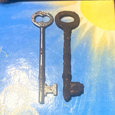 Lot of 2 Antique Metal Skeleton Keys - 1 Silver Key, 1 Rusted Key picture