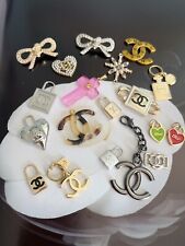 Lot of 19 Chanel buttons and zipper Pulls picture