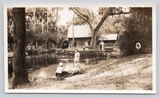 Vintage Photo People Gathered Around Log Cabin and Lake Watermill picture
