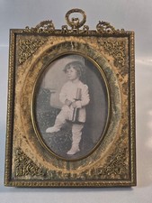 Late 19th to Early 20th Century Gilt Brass Leatherette Oval Frame picture