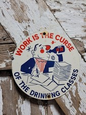 VINTAGE BANKERS PORCELAIN SIGN RARE OLD WORK IS THE CURSE OF THE DRINKING CLASS picture