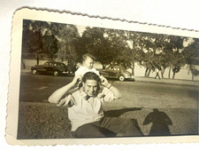 Vtg original B&W snapshot photo shadow cute father cars 1950s dad affectionate picture