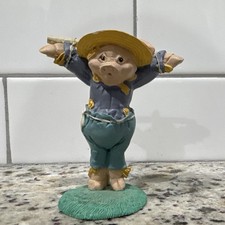 Vintage Enesco pig scarecrow figurine designed by artist Kathy Wise. picture