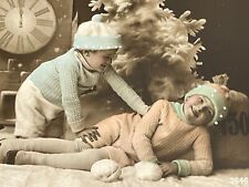 B1 RPPC Postcard Boy Girl Playful Winter Christmas Scene picture