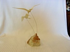 Two Sea Gulls Standing Figurine on Wire Mounted on a Rock picture