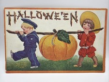Embossed Halloween Postcard Boy Sailor Suit and Girl Carrying Giant Pumpkin picture