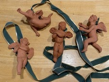 4 Angels. MMA Metropolitan Museum of Art Terracotta Cherub  Figurines ornaments  picture