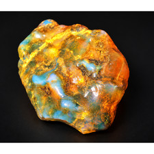 Nature created orange blue rough specimen Dominican amber 8.9g picture