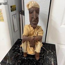 Vintage Yoruba tribal African folk art of a sitting man 15” picture