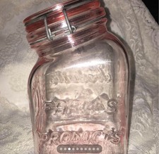 Vintage Pink Glass Farm Products Jar with Wire Bail Lid picture