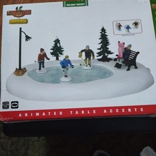 6 of 8 pieces & rink LEMAX Coventry Cove Animated Holiday Hockey Village picture