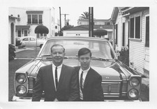 1965 Ford Galaxie 500 Sedan 1960s Photo Father Son Suit Sitting Bumper Cool picture