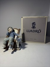 LLADRO “ALL TUCKERED OUT” - 5846, Retired with box. CHIP IN EAR. AS IS picture