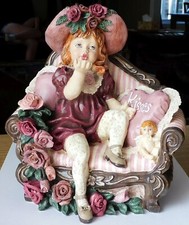 Fayzah Spanos Girl Doll Blowing Kisses Ornament Sculpture 8 x 7